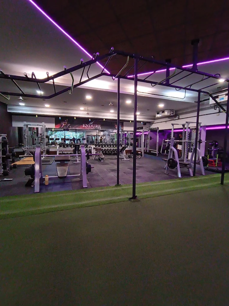 Spacious equipment and functional fitness area at Divine Fitness Club